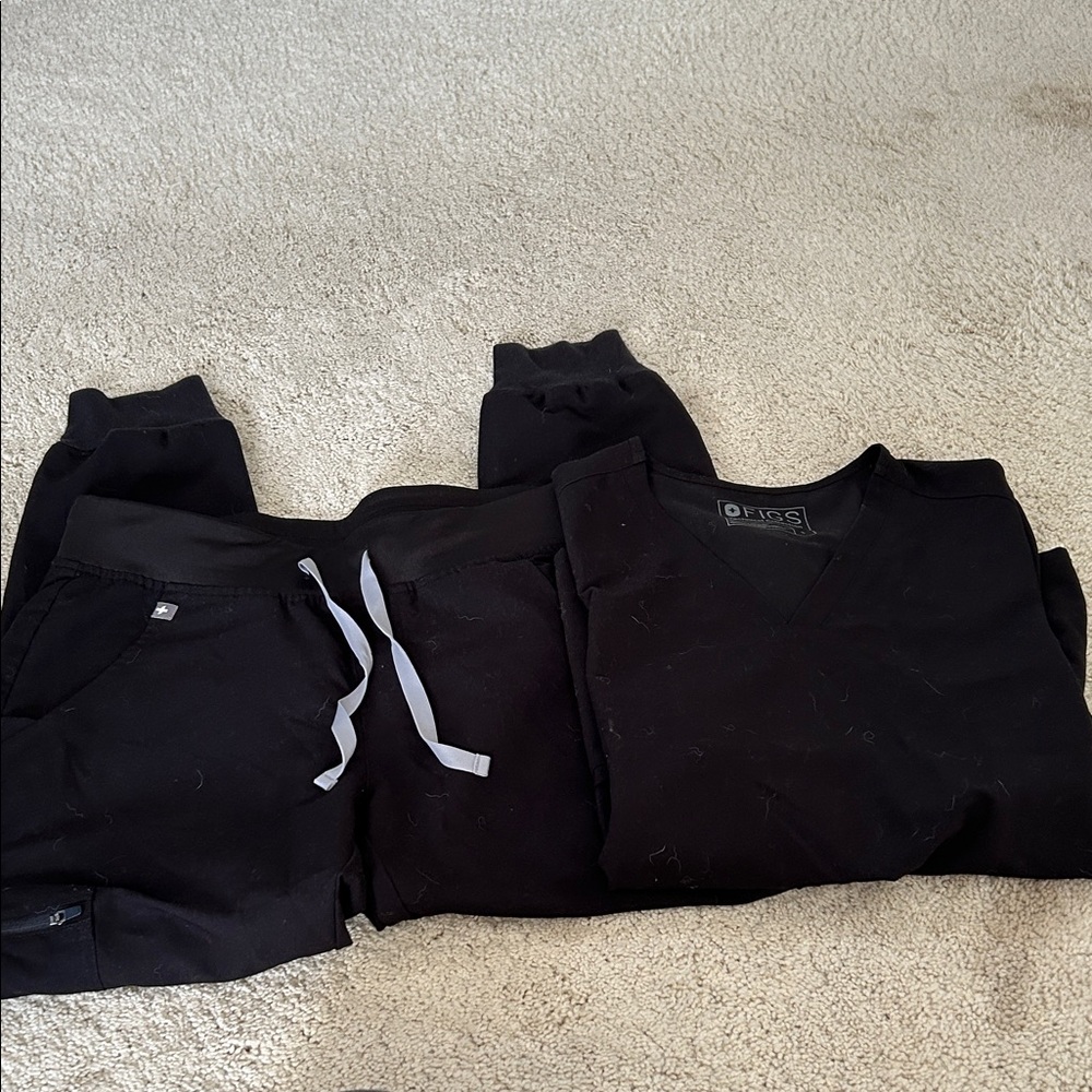 Figs Black Scrub Ensemble. Joggers and top with two pockets.